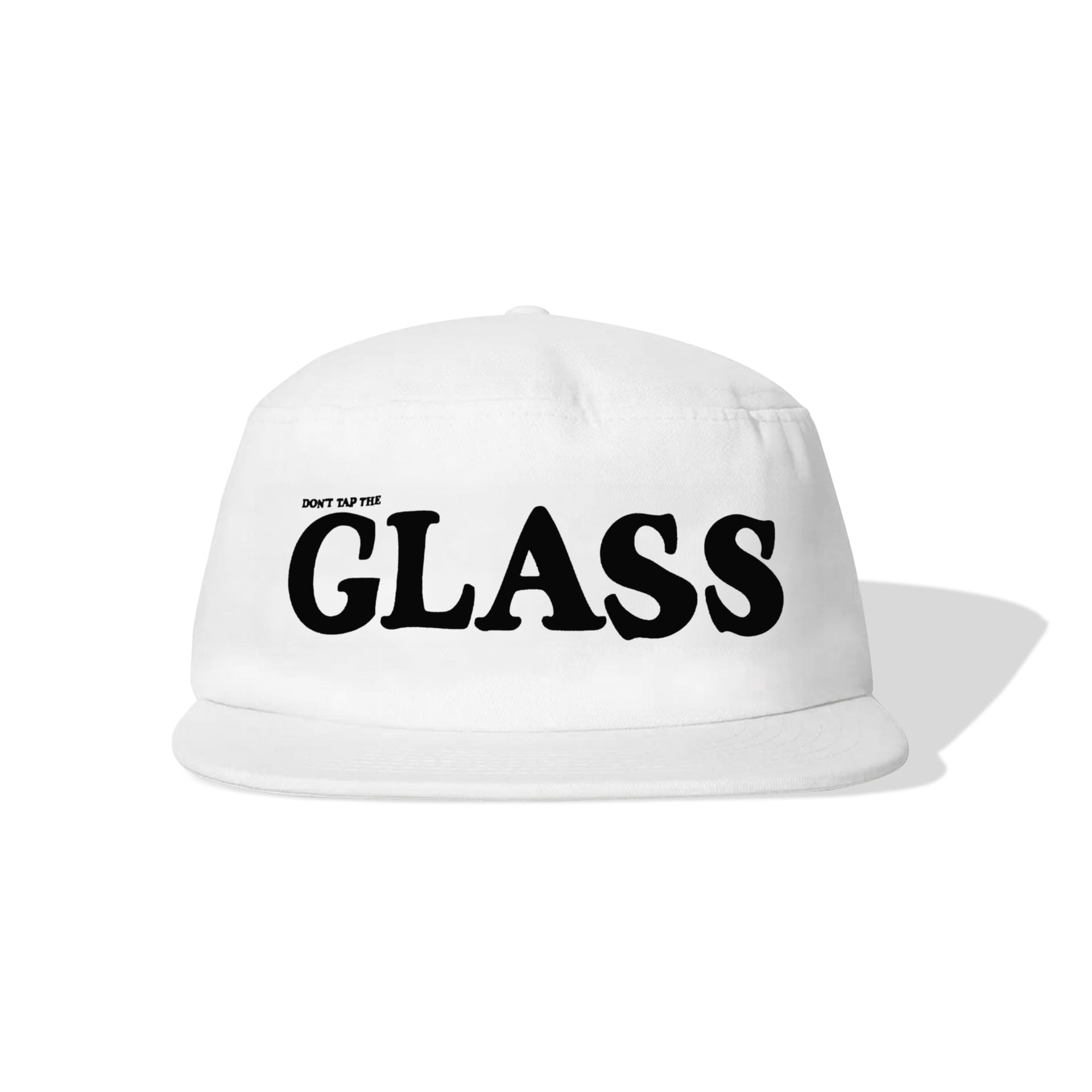 A white five-panel cap with a flat brim, featuring the text 'DON'T TAP THE GLASS' printed in black on the front, set against a plain white background with a soft shadow.